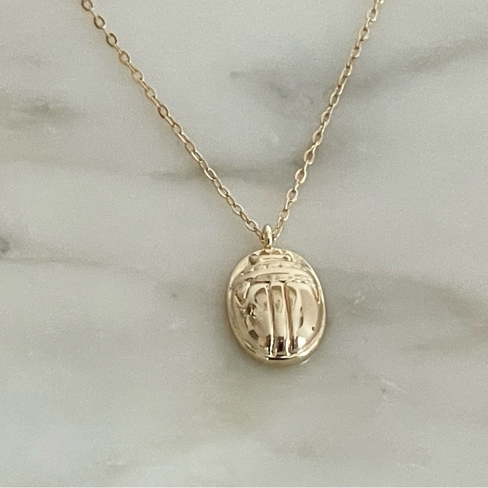 Dainty gold scarab necklace